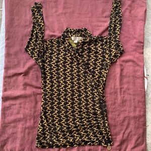 Woman’s MICHAEL KORS top. Size Medium.